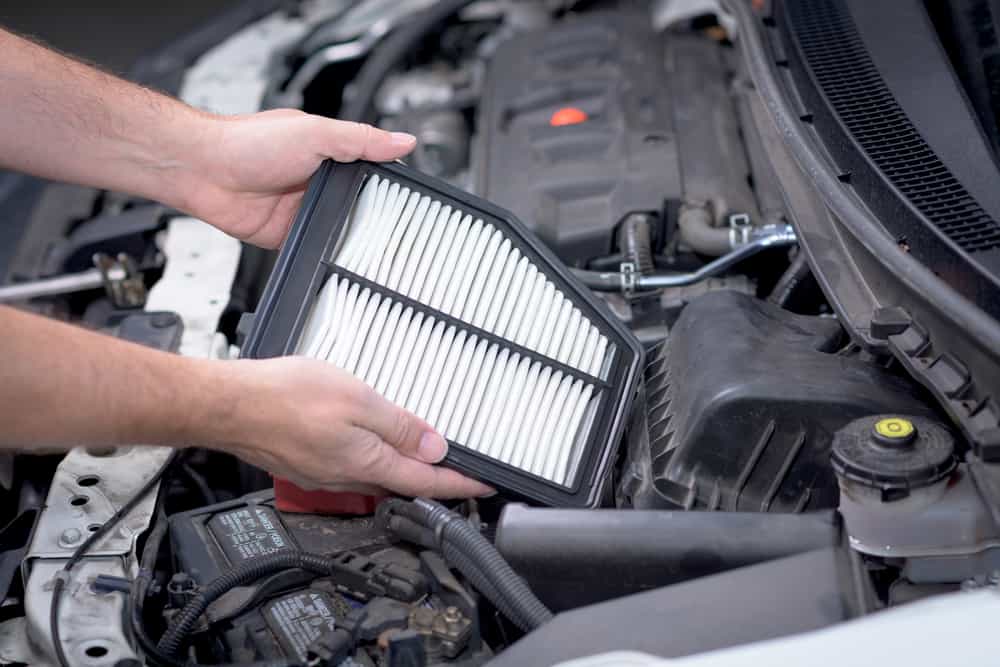 detach the air filter casing from the engine